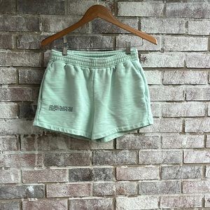 Pangaia moss green sweat shorts